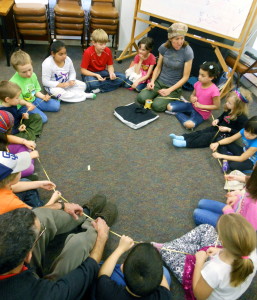 Students in circle for science